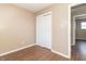 Spacious bedroom with double door closet and wood flooring at 1704 Nelson Ave, Indianapolis, IN 46203