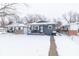 House exterior with snowy yard and walkway at 1704 Nelson Ave, Indianapolis, IN 46203