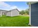 The home's backyard features fresh sod at 1705 Real St, Indianapolis, IN 46240