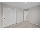 Clean bedroom features closet and neutral paint at 1705 Real St, Indianapolis, IN 46240