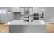 Bright kitchen featuring quartz countertops, stainless steel appliances, and a large island at 1705 Real St, Indianapolis, IN 46240