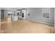 Spacious living area showcasing hardwood floors and abundant natural light at 1705 Real St, Indianapolis, IN 46240