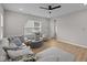 Comfortable living room with a large window, cozy seating, and modern decor at 1705 Real St, Indianapolis, IN 46240