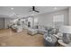 Open-concept living area with stylish furnishings, seamlessly connecting the kitchen and dining space at 1705 Real St, Indianapolis, IN 46240