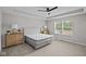 Bright main bedroom featuring plush carpet, neutral colors, and natural light at 1705 Real St, Indianapolis, IN 46240