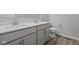 Bathroom features double sinks with quartz countertop and modern fixtures at 1709 Real St, Indianapolis, IN 46240