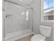 Modern bathroom with a sleek glass shower and marble tile at 1709 Real St, Indianapolis, IN 46240