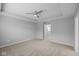 Spacious bedroom with a tray ceiling and neutral carpet at 1709 Real St, Indianapolis, IN 46240