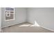 Bedroom featuring plush carpeting and a bright window at 1709 Real St, Indianapolis, IN 46240