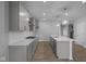 Modern kitchen with stainless steel appliances, quartz countertops, and an island at 1709 Real St, Indianapolis, IN 46240