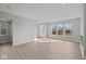 Bright, open-concept living room with hardwood floors and large windows at 1709 Real St, Indianapolis, IN 46240