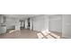 Open-concept living space featuring hardwood floors and neutral paint at 1709 Real St, Indianapolis, IN 46240