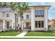 Beautiful modern home with eye-catching design, manicured lawn and inviting front porch at 1822 Central Ave, Indianapolis, IN 46202