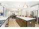 Spacious kitchen with a large island, stainless steel appliances, and ample cabinet space at 1822 Central Ave, Indianapolis, IN 46202
