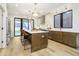 Modern kitchen featuring stainless steel appliances, two-tone cabinetry and large island at 1822 Central Ave, Indianapolis, IN 46202