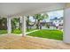 Covered patio overlooking a lush green backyard and neighboring properties at 1822 Central Ave, Indianapolis, IN 46202
