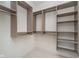 Well-organized walk-in closet with ample shelving and hanging space at 1822 Central Ave, Indianapolis, IN 46202