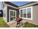 Backyard patio with a grill and sliding glass door that leads inside the home at 19629 Astoria Ave, Sheridan, IN 46069