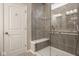Bathroom with walk-in shower and built-in seat at 19629 Astoria Ave, Sheridan, IN 46069