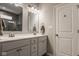 Modern bathroom with double vanity and large mirror at 19629 Astoria Ave, Sheridan, IN 46069