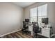 A home office setup with dual monitors, comfortable chairs and a bright window at 19629 Astoria Ave, Sheridan, IN 46069