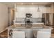 Modern kitchen with white cabinets, granite countertops and stainless steel appliances at 19629 Astoria Ave, Sheridan, IN 46069