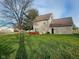 House with deck and grassy backyard at 2062 Sumpter Trl, Columbus, IN 47203
