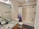 Simple bathroom with tub shower combo and granite vanity at 2062 Sumpter Trl, Columbus, IN 47203