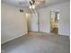 Spacious bedroom with carpet flooring and access to a bathroom at 2062 Sumpter Trl, Columbus, IN 47203