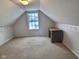 Bright bonus room with window, carpet flooring, and a desk at 2062 Sumpter Trl, Columbus, IN 47203
