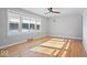 Bright living room featuring hardwood floors and large windows at 2480 E 99Th St, Carmel, IN 46280