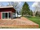 Expansive wooden deck offering ample space, natural landscaping, and peaceful greenery at 2894 W Grove Dr, Greenfield, IN 46140