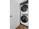 Conveniently stacked washer and dryer in a closet provide for easy laundry access at 2894 W Grove Dr, Greenfield, IN 46140