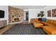 Inviting living room showcases a stone fireplace and comfortable seating area at 2894 W Grove Dr, Greenfield, IN 46140