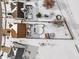 Aerial view of house and backyard in a snowy neighborhood at 300 Winterset Way, Greenwood, IN 46143