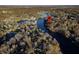 Aerial view showcasing home location on a lake at 387 W Roszell Dr, Nineveh, IN 46164