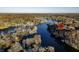 Aerial view showcasing home location on a lake at 387 W Roszell Dr, Nineveh, IN 46164