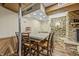 Basement wet bar with stone wall and popcorn machine at 387 W Roszell Dr, Nineveh, IN 46164