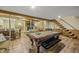 Basement recreation area with pool table and fireplace at 387 W Roszell Dr, Nineveh, IN 46164
