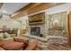 Basement recreation room featuring a stone fireplace and comfortable seating at 387 W Roszell Dr, Nineveh, IN 46164