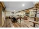 Game room with pool table, stone fireplace, and wet bar at 387 W Roszell Dr, Nineveh, IN 46164