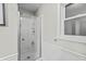 Clean shower with glass enclosure and built in shelves at 387 W Roszell Dr, Nineveh, IN 46164