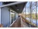 Long deck with steps down to the lake, offering scenic views at 387 W Roszell Dr, Nineveh, IN 46164