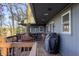 Deck with lake view, seating area, and gas grill at 387 W Roszell Dr, Nineveh, IN 46164