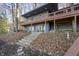 Home with large deck and stairs leading to a wooded area at 387 W Roszell Dr, Nineveh, IN 46164