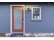 Exterior view of a home with a modern door and window at 387 W Roszell Dr, Nineveh, IN 46164