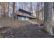 Lakefront home nestled in the woods, with a spacious deck at 387 W Roszell Dr, Nineveh, IN 46164