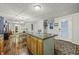Open concept kitchen with island, looking toward dining area at 387 W Roszell Dr, Nineveh, IN 46164