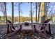 Enjoy a relaxing lake view from the comfort of Adirondack chairs at 387 W Roszell Dr, Nineveh, IN 46164