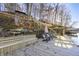 Spacious lakefront dock with seating and covered area at 387 W Roszell Dr, Nineveh, IN 46164